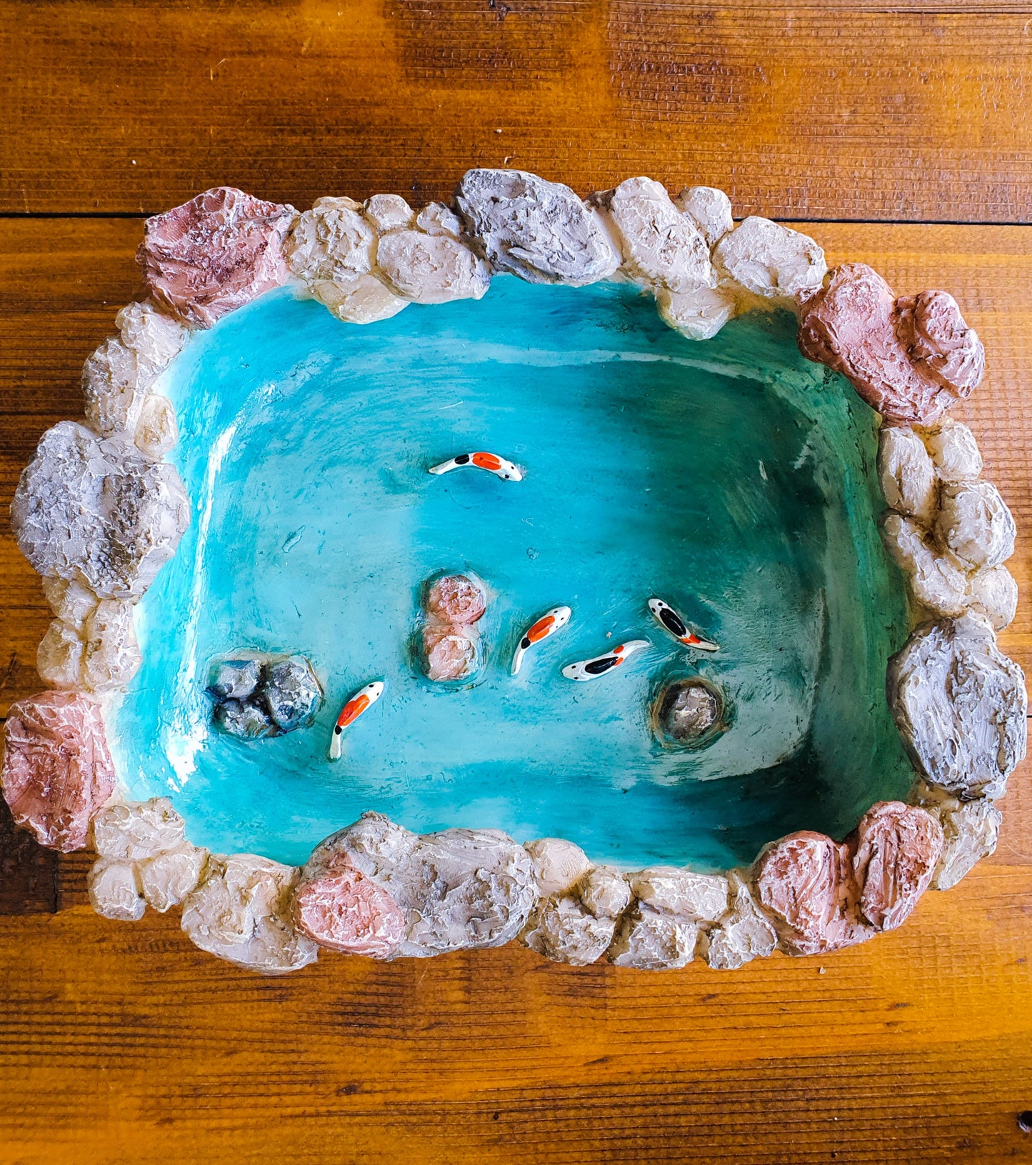Koi Pond with floating lily